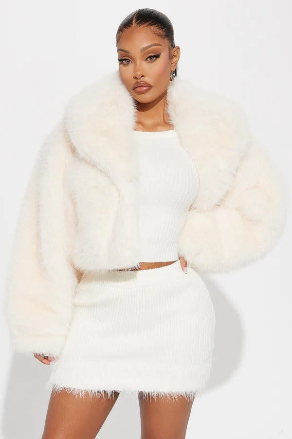 Manteau en fausse fourrure