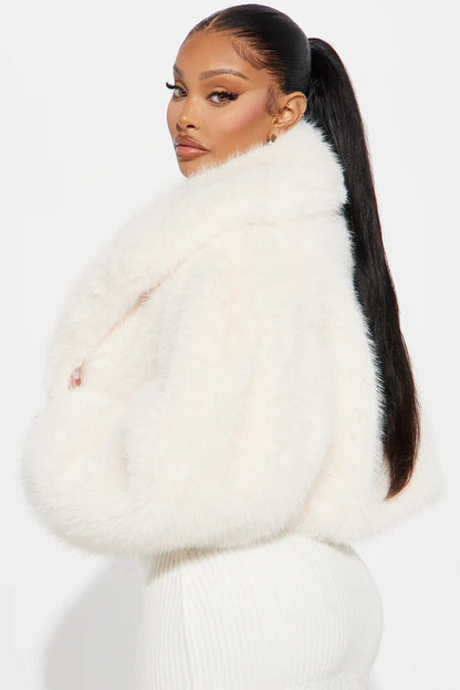 Manteau en fausse fourrure